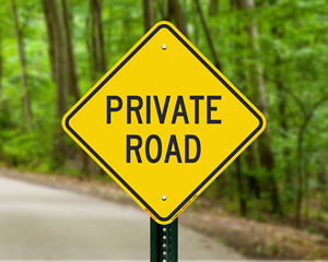 Yellow private road sign