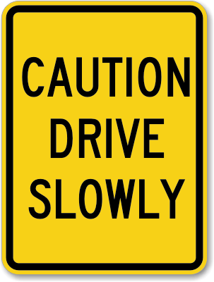 Caution drive slowly sign