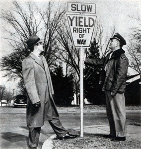 1950 two men and a yield sign