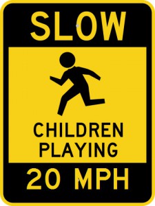 Slow children playing 20 mph sign