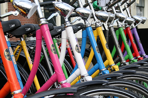 Row of multicolored bicycles