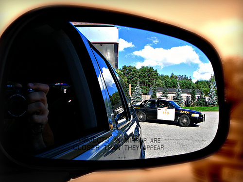 police in rearview mirror