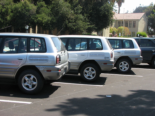 Three RAV electric vehicles parked