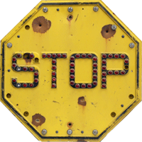 Yellow stop sign with red cataphotes