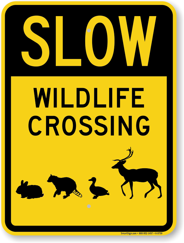 caution animals loose sign 