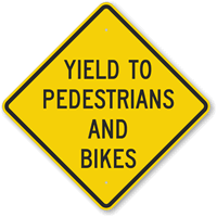 Yield To Pedestrians And Bikes Sign