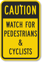 Caution - Watch For Pedestrians And Cyclists Sign