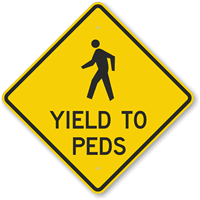 Yields To Peds Sign
