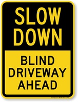 Blind Driveway Ahead Slow Down Sign