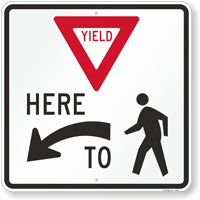 Yield Here To Pedestrians - Crossing Sign