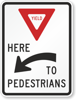 Yield Here to Pedestrians Regulatory Sign with Arrow