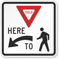 Yield Here to Pedestrians Regulatory Sign with Arrow