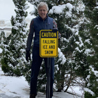 Caution falling ice and snow sign